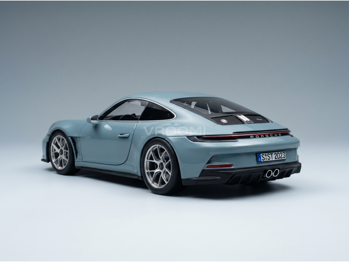 Light blue Porsche 911 scale model car with detailed rear, silver wheels, and 'S ST 2023' plate — Vroomi