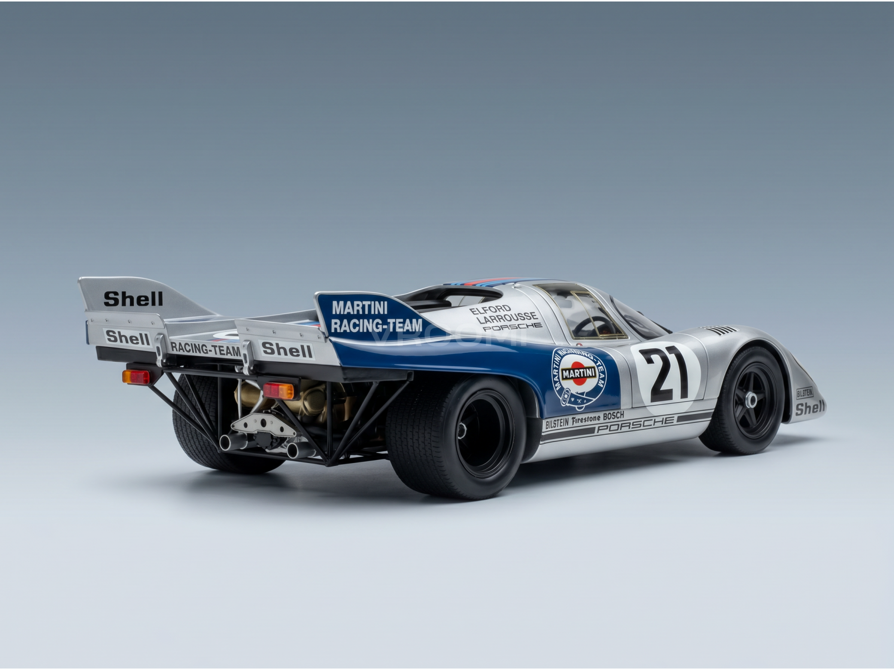 Modèle réduit de voiture Porsche à l'échelle 1/21 de l'écurie Martini Racing, fabriqué par Vroomi, arborant les couleurs de Shell et Bosch