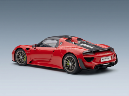 Red Porsche 918 Spyder scale model car with carbon fiber details, showcased for Vroomi collectors.