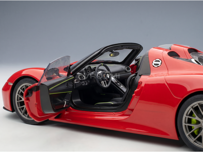 Red Porsche 918 Spyder scale model car with open doors, detailed interior, at Vroomi