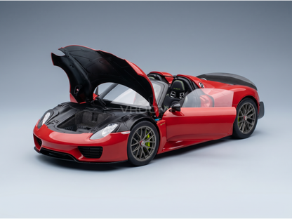 Red scale model car with open hood, detailed engine, and sleek design from Vroomi