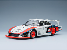 Martini Porsche scale model car with Shell and Dunlop branding, showcased by Vroomi