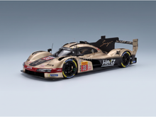 Porsche 963 LMDh #38 Hertz scale model car, gold and black livery, Vroomi