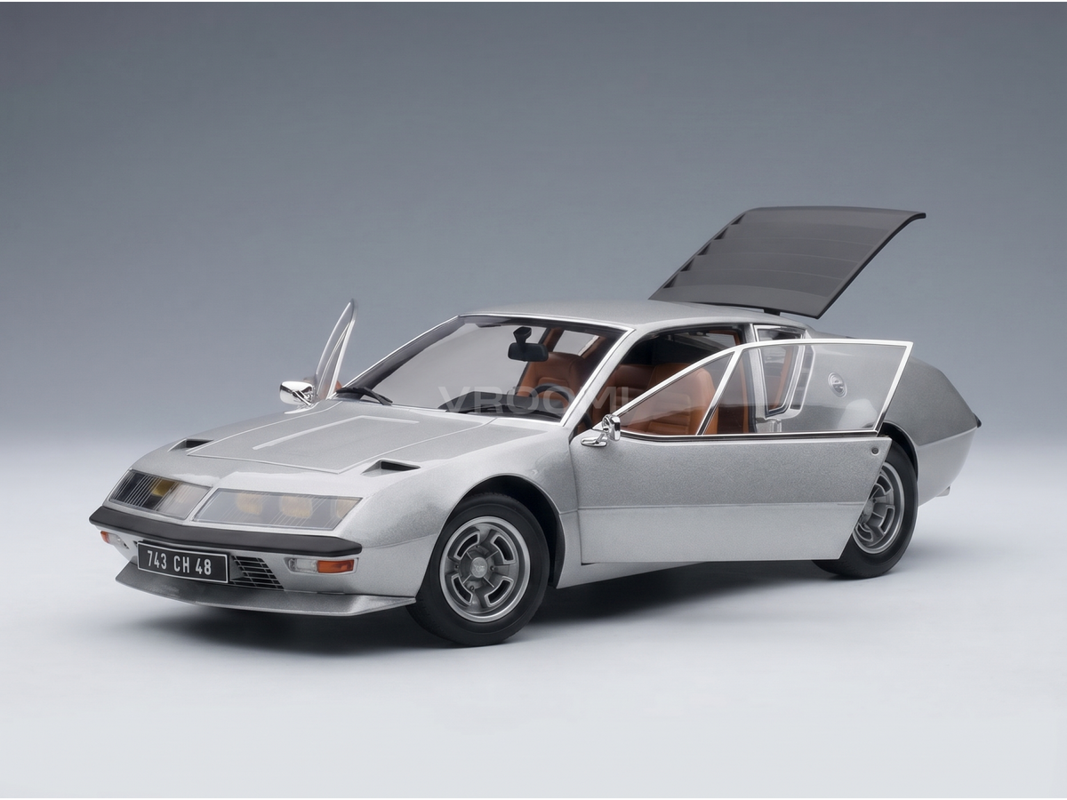 Silver scale model car with open doors and hood, detailed interior, from Vroomi