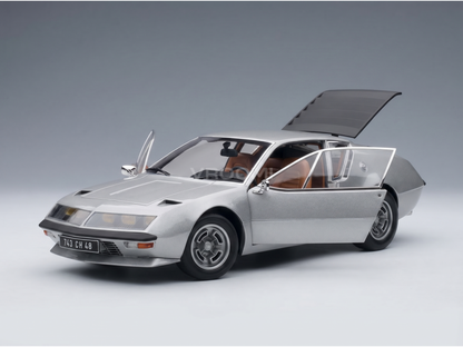 Silver scale model car with open doors and hood, detailed interior, from Vroomi