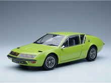 Vroomi lime green scale model car with sleek design and classic wheels, perfect for collectors.