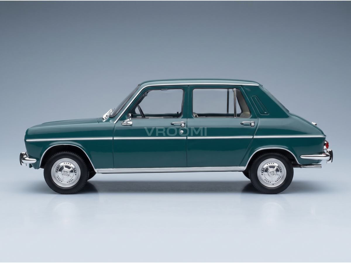 Green 1970s sedan scale model car with chrome details, showcased by Vroomi for collectors.