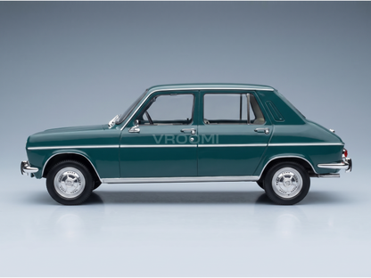 Green 1970s sedan scale model car with chrome details, showcased by Vroomi for collectors.