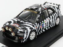 SUBARU - IMPREZA WRC N.º 38 RALLY DE PORTUGAL 2001 N. HEATH - S. LANCASTER - WHITE BLACK Modelo de carro em escala na Vroomi