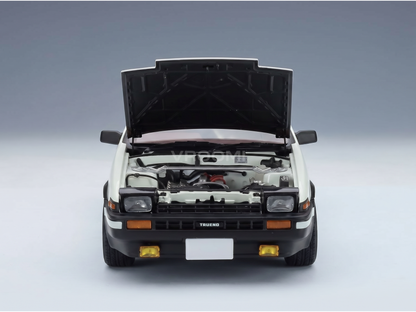 White Toyota Trueno scale model car with open hood, detailed engine, at Vroomi