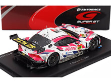 Toyota GR Supra Super GT 2025 scale model car by Vroomi, featuring Hoppy livery and driver names T. Matsui - K. Sato