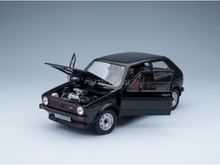 Black Volkswagen GTI scale model car with open hood and doors, detailed engine and interior, Vroomi
