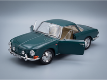 Vroomi scale model car: green classic coupe with open doors, detailed interior, chrome wheels, and license plate K-MH522