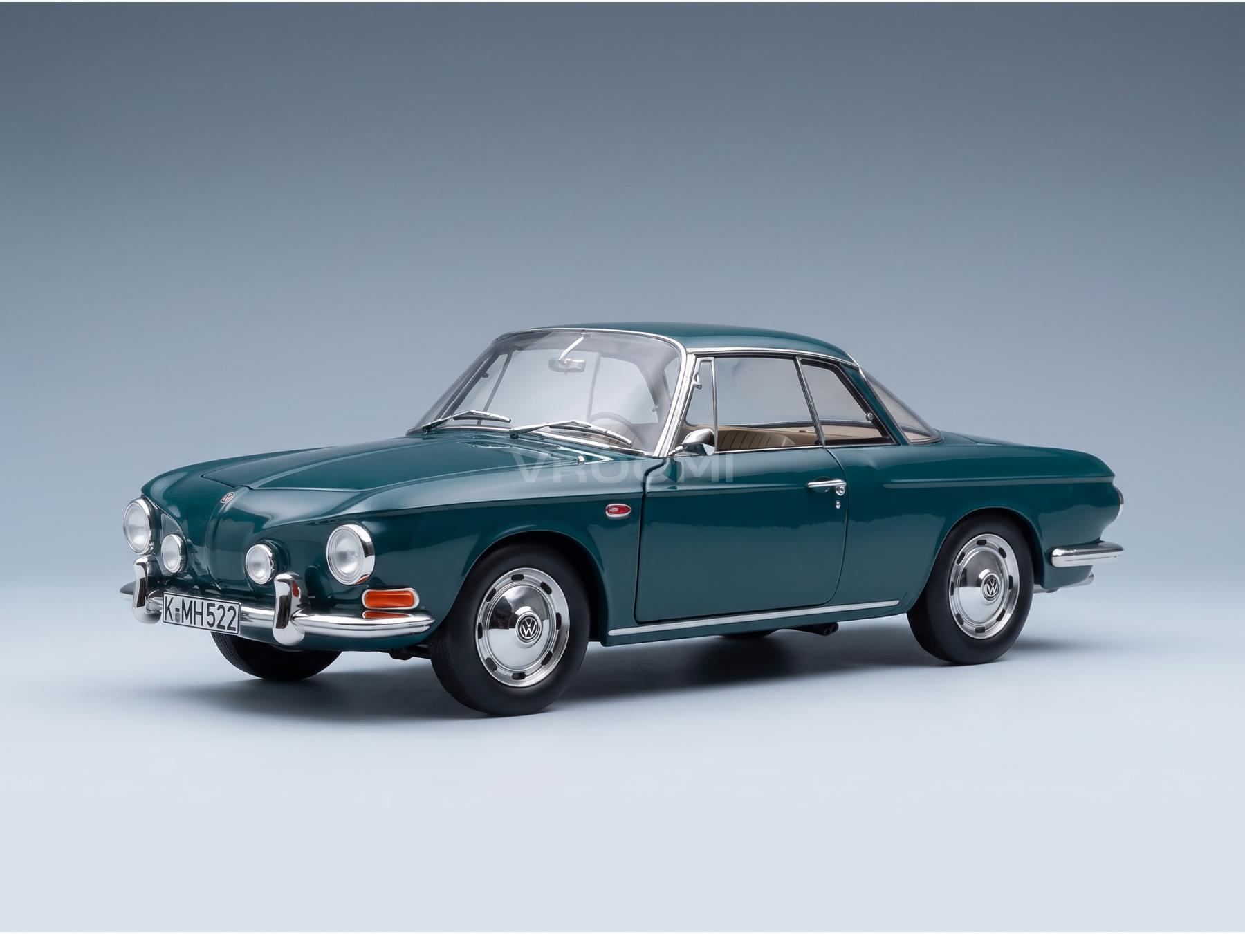 Vroomi scale model car: classic green Volkswagen Karmann Ghia with chrome details and tan interior