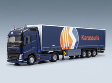 Volvo FH4 500 Truck Telonato Karassulis Transports 2020 Blue Eligor 1:43 scale model - front three-quarter view