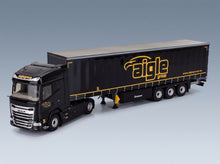 DAF XG Truck Cassonato Remorque Tautliner Aigle Group 2022 Black Yellow Eligor 1:43 scale model - front three-quarter view