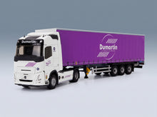 Volvo FH 500 Truck Telonato Dumartin Transports 2024 White Purple Eligor 1:43 scale model - front three-quarter view