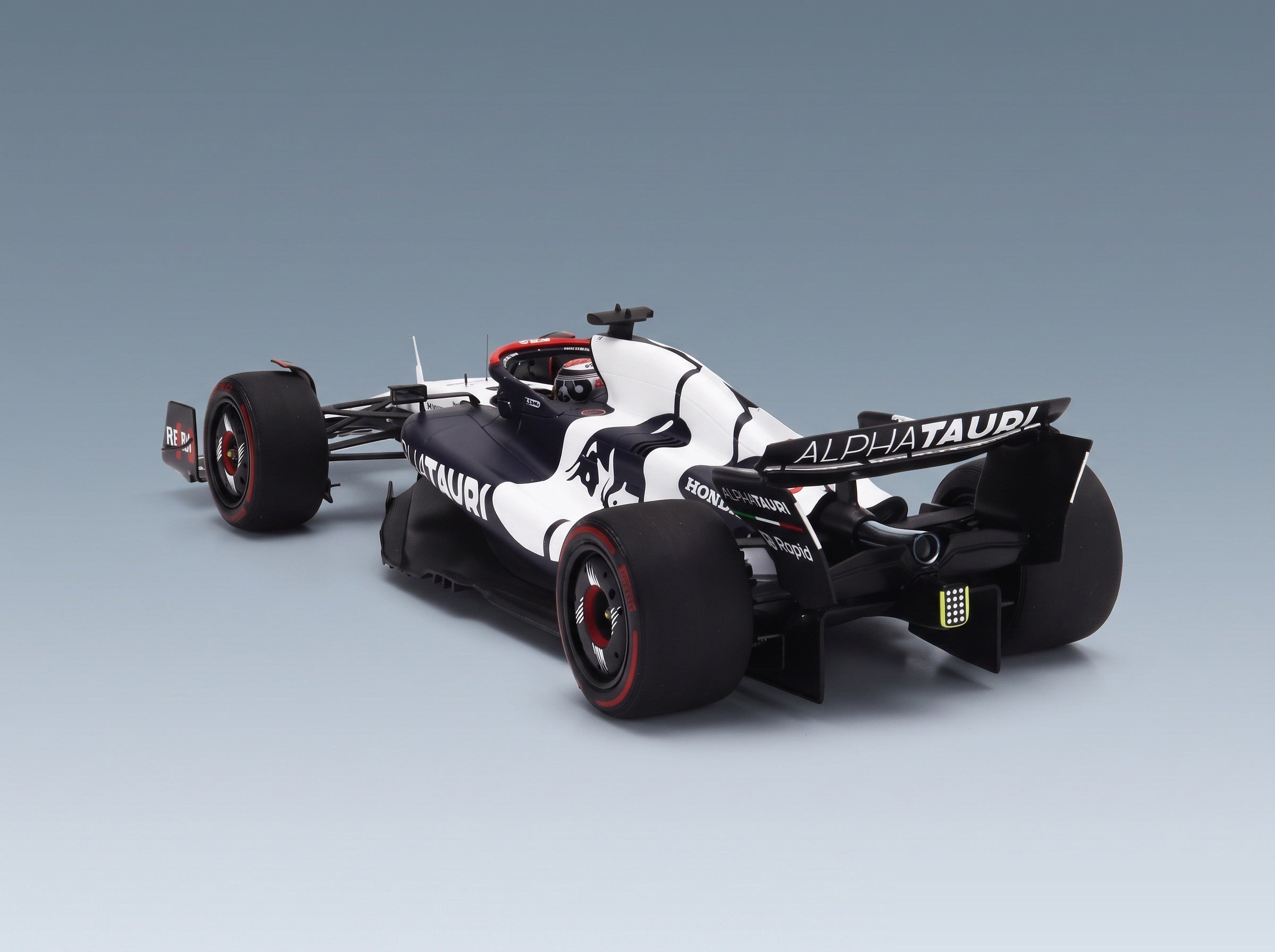 AlphaTauri AT04 Team AlphaTauri No. 21 Nyck De Vries Silverstone British GP 2023 Minichamps 1:18 scale model - rear three-quarter view