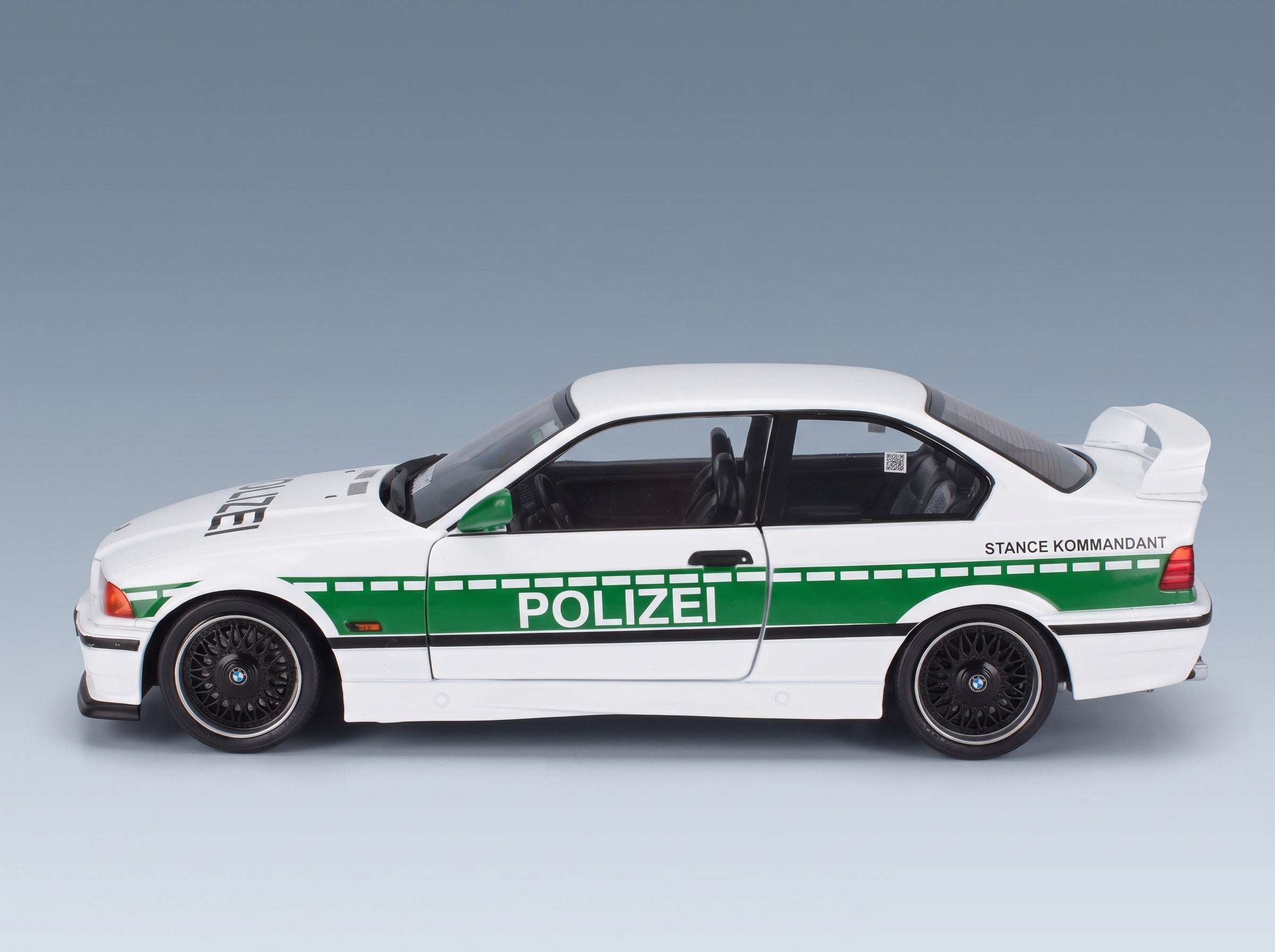BMW 3 Series M3 (E36) Coupé Polizei 1991 White Green Solido 1:18 scale model - side view