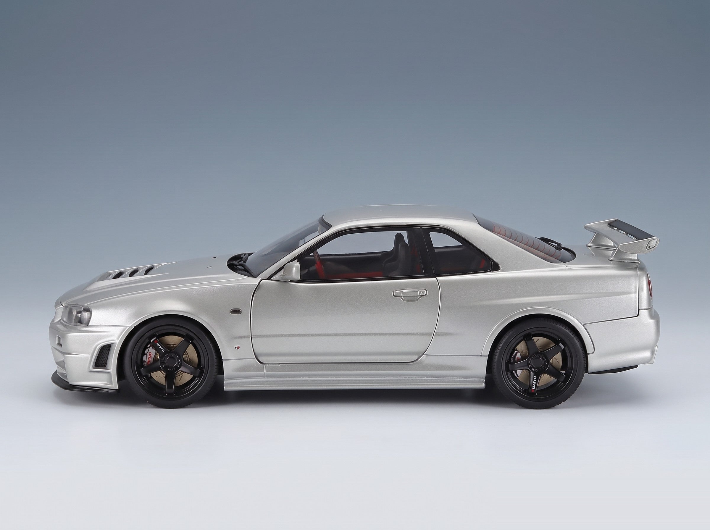 Nissan Skyline GT-R R34 Z-Tune 1999 Silver Solido 1:18 scale model - side view
