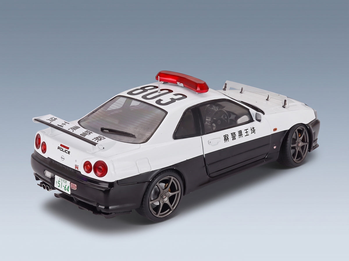 Nissan Skyline GT-R (BNR34) Japan Police 2019 White Black Solido 1:18 - rear three-quarter view