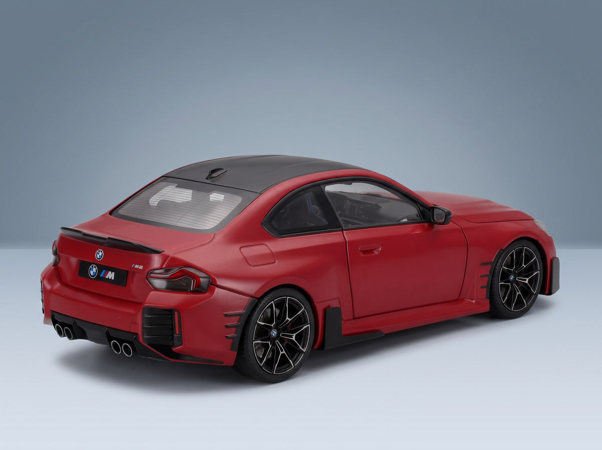 BMW 2-Series M2 M-Performance Parts (G87) 2024 Red Black Solido 1:18 scale model - rear three-quarter view