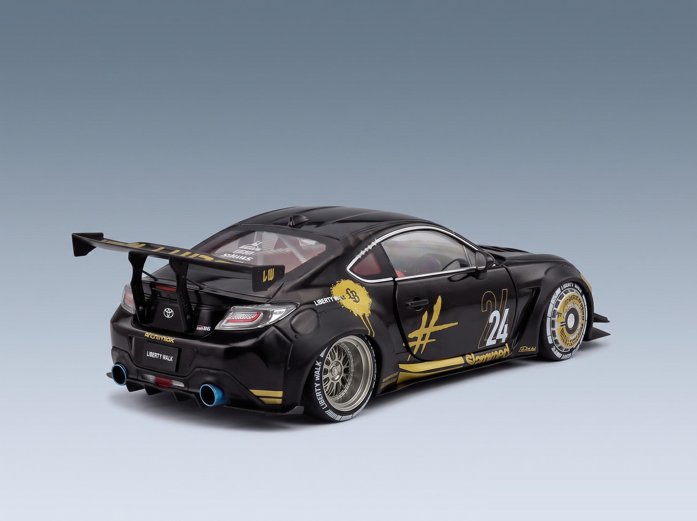 Toyota GR86 LBWK Body Kit No. 24 Coupé 2024 Black Gold Solido 1:18 scale model - rear three-quarter view