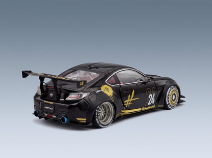 Toyota GR86 LBWK Body Kit No. 24 Coupé 2024 Black Gold Solido 1:18 - rear three-quarter view