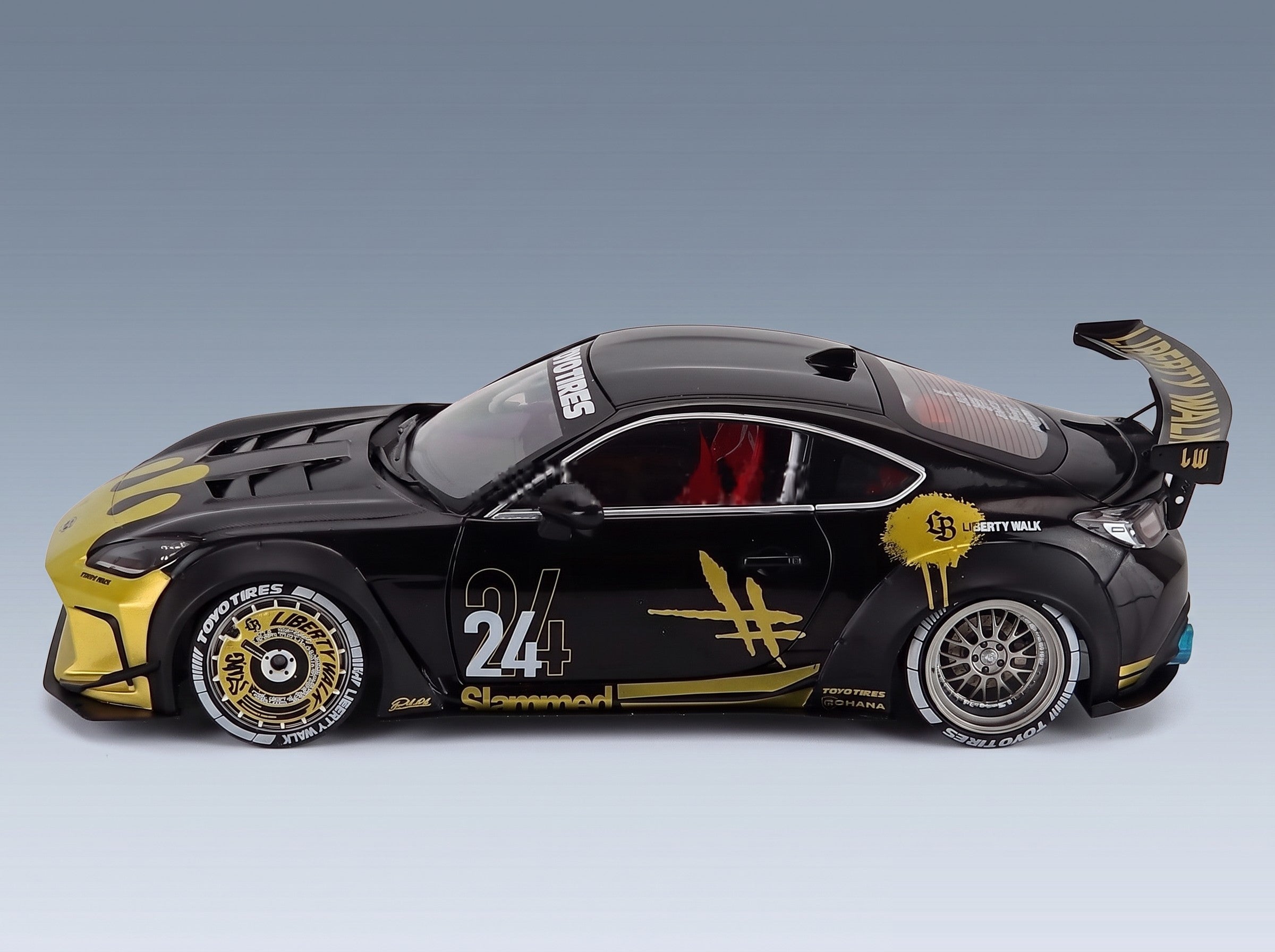 Toyota GR86 LBWK Body Kit No. 24 Coupé 2024 Black Gold Solido 1:18 scale model - side view