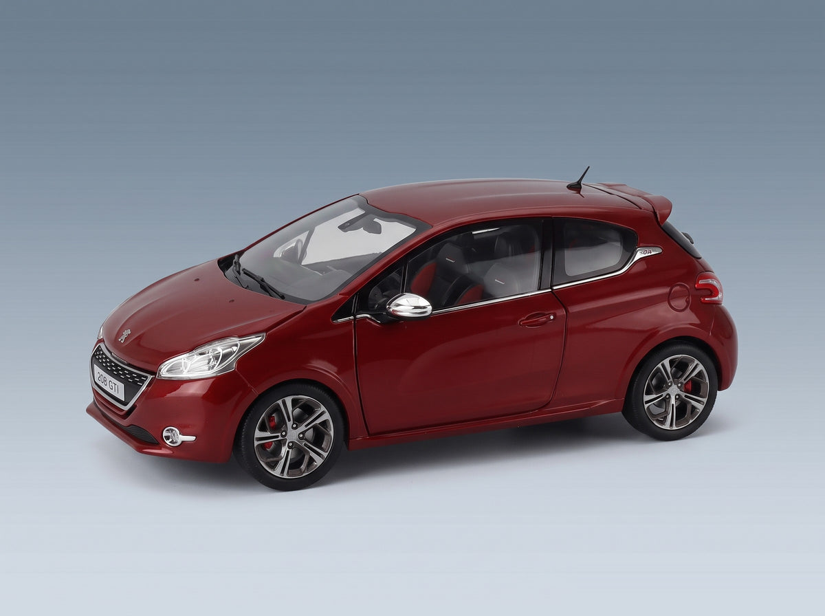 Peugeot 208 GTI 2013 Rubis Red Metallic Norev 1:18 scale model - front three-quarter view