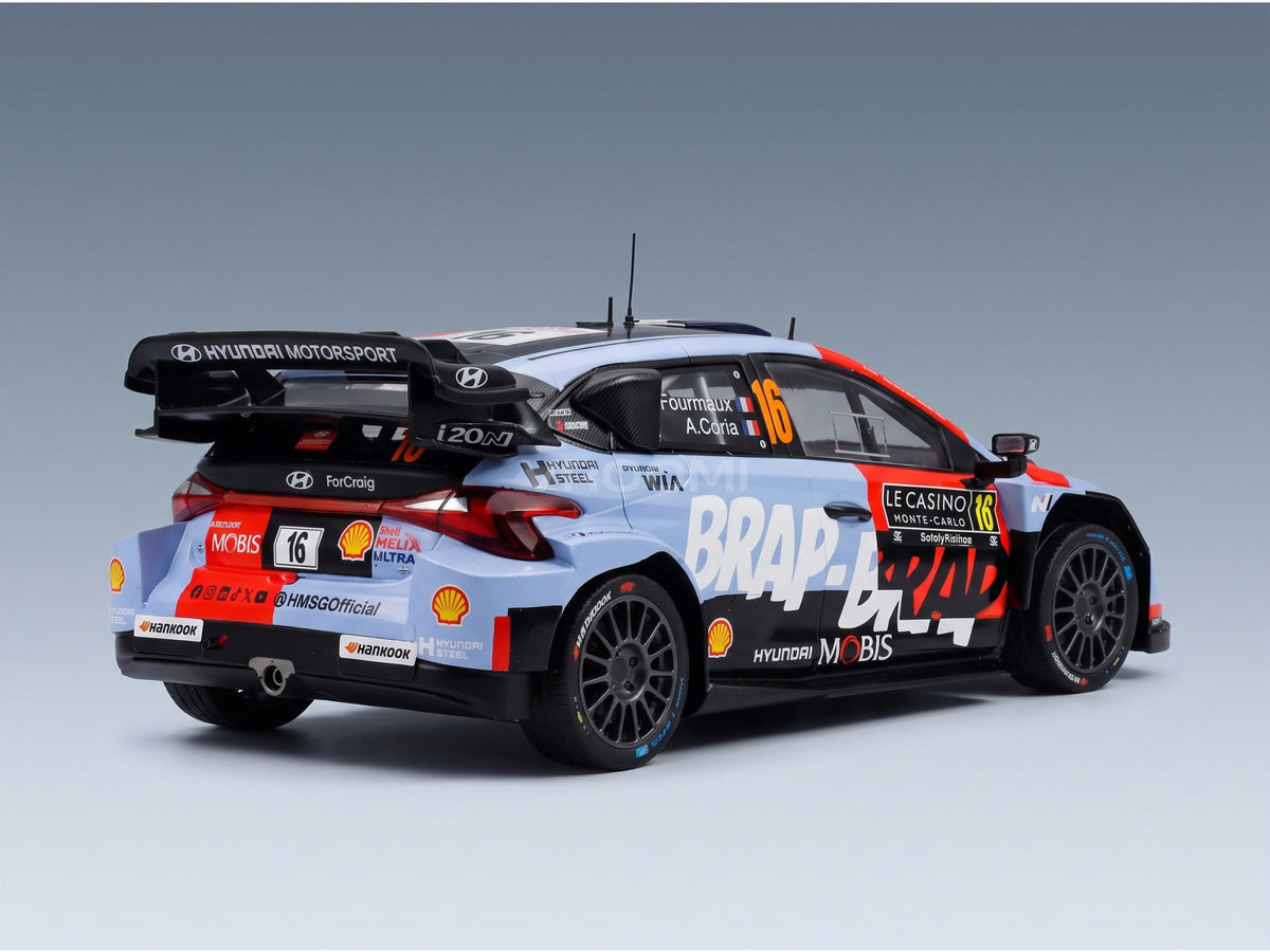 HYUNDAI - i20 N WRC RALLY1 TEAM SHELL MOBIS WRT N 16 RALLY MONTECARLO 2026 ADRIEN FOURMAUX - ALEXANDRE CORIA - RED LIGHT BLUE BLACK scale model - rear three-quarter view
