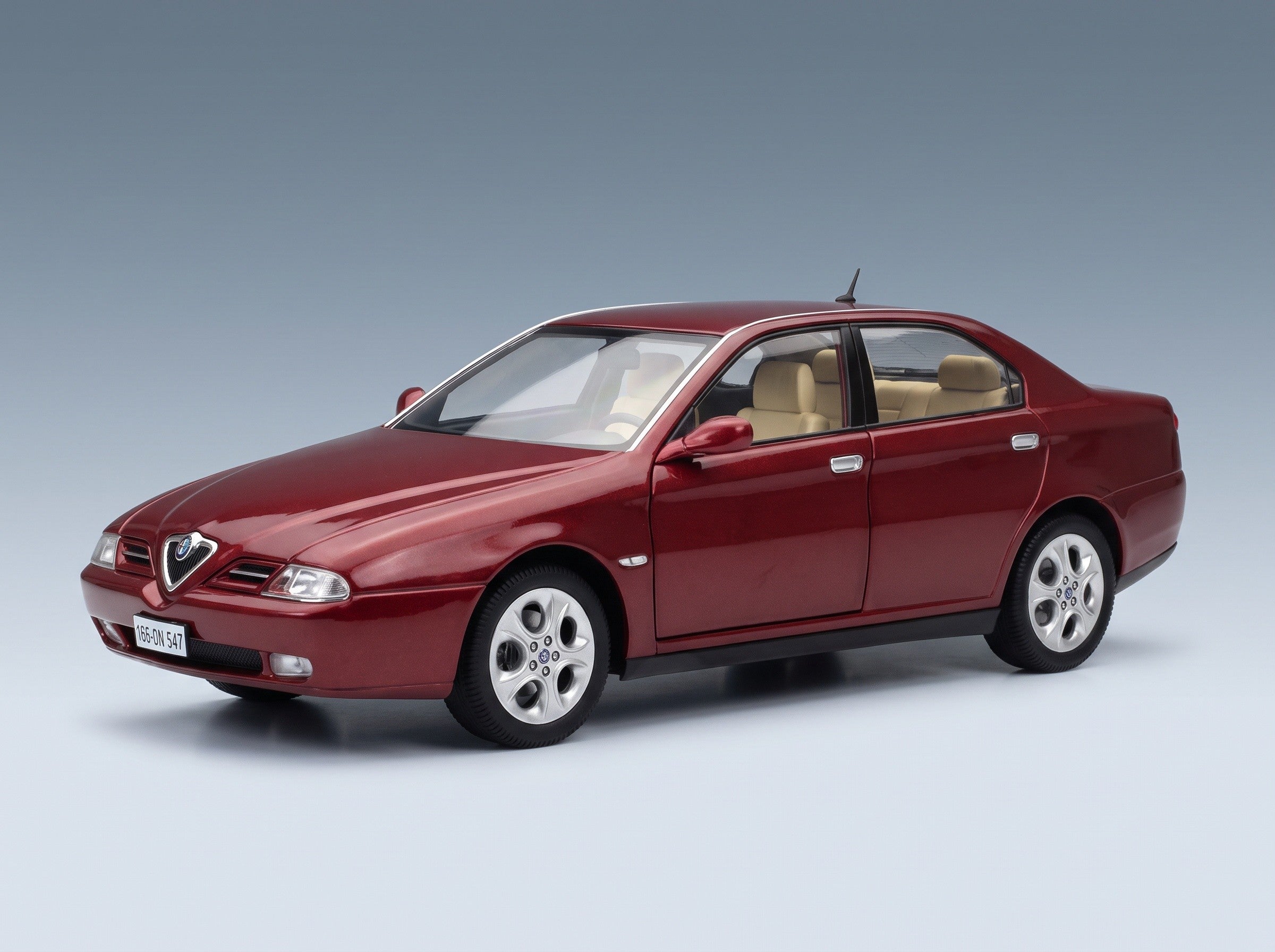Alfa Romeo 166 3.0 V6 1998 Rosso Proteo Metallizzato Beige Interior Mitica 1:18 scale model - front three-quarter view