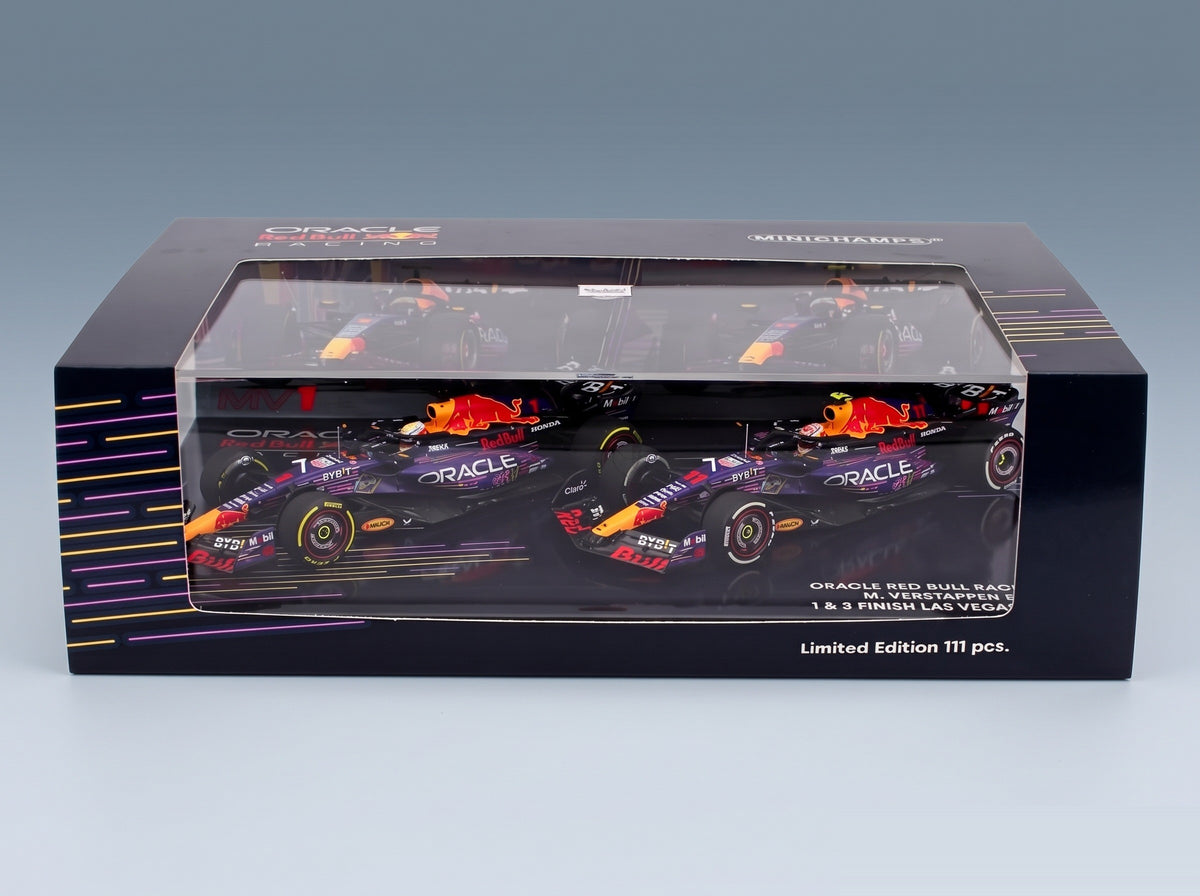 Red Bull RB19 Set 2x Oracle Red Bull Racing No. 1 Max Verstappen World Champion Winner Las Vegas USA GP + No. 11 3rd Las Vegas USA GP Sergio Perez 2023 Minichamps 1:43 scale model - side view in display case
