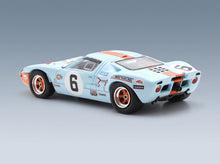 FORD USA - GT40 4.9L V8 TEAM JW AUTOMOTIVE ENGINEERING N 6 WINNER 24h LE MANS 1969 JACKY ICKX - JACKIE OLIVER - LIGHT BLUE ORANGE - rear three-quarter view