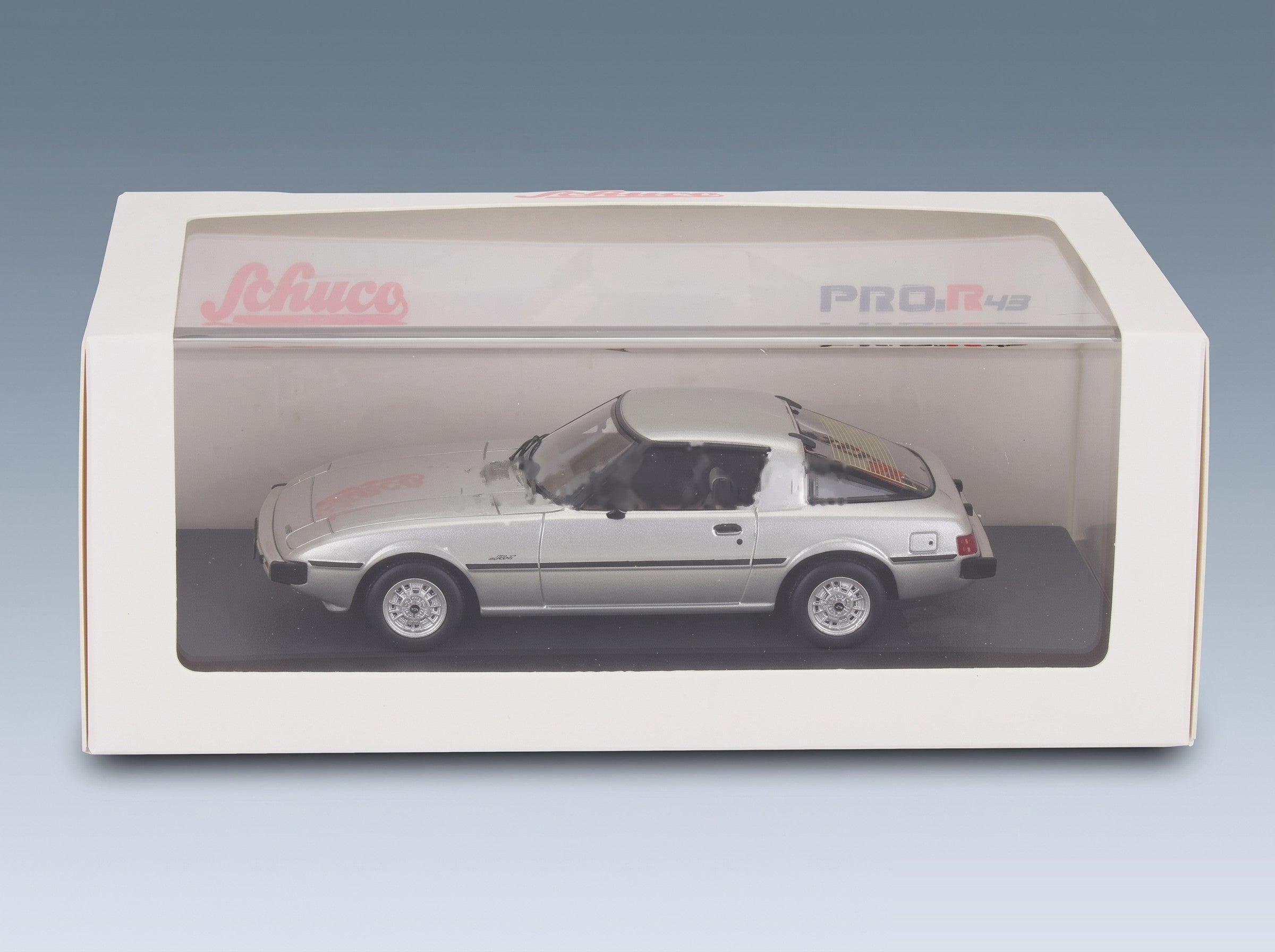Mazda Savanna RX-7 1978 Silver Schuco 1:43 scale model - original packaging