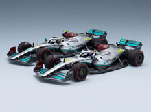 Mercedes W13E Set 2x Mercedes-AMG Petronas F1 No. 44 3rd Bahrain GP Lewis Hamilton No. 63 4th Bahrain GP George Russell 2022 Minichamps 1:43 scale model - front three-quarter view