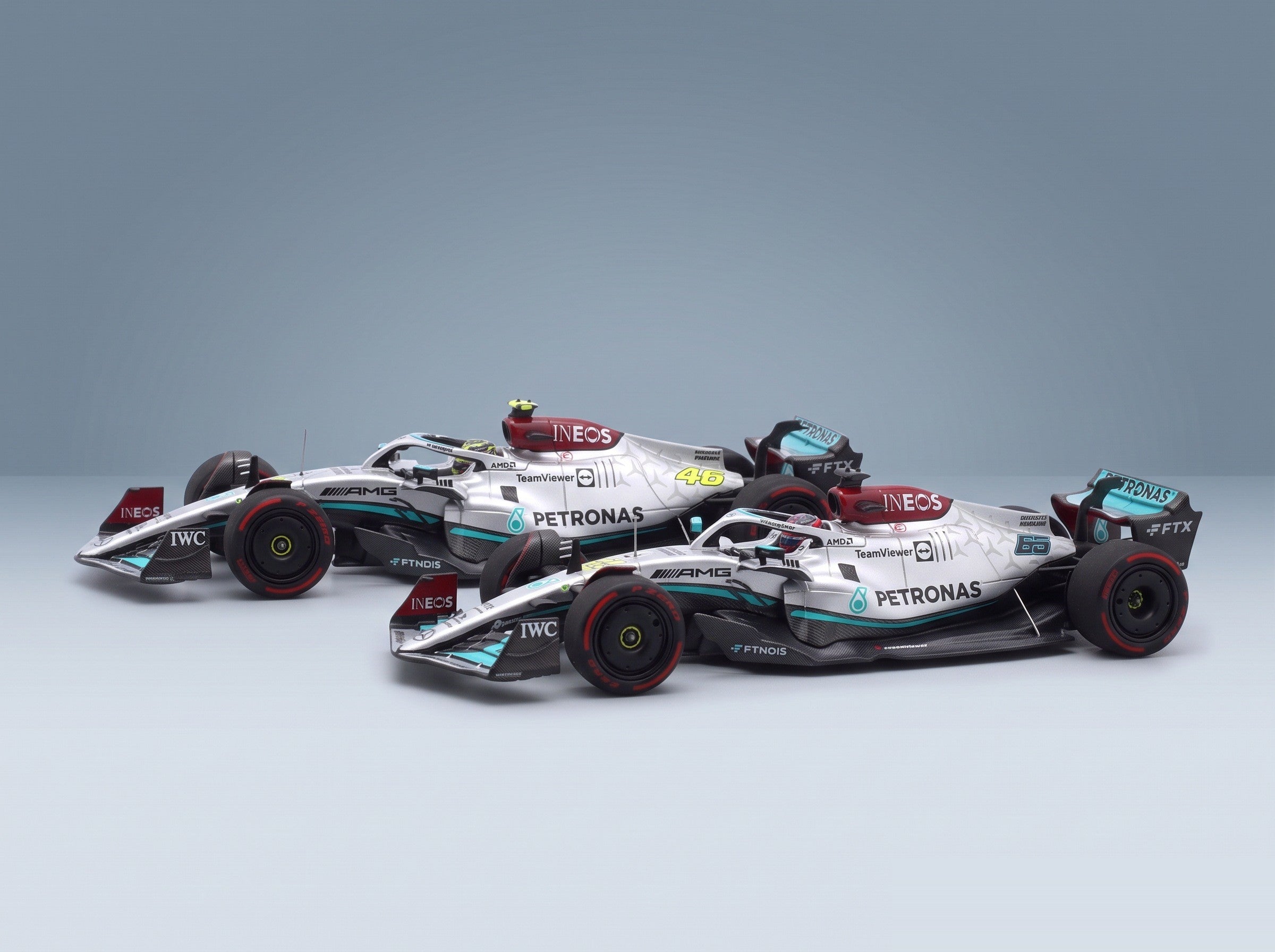 Mercedes W13E Set 2x Mercedes-AMG Petronas F1 No. 44 3rd Bahrain GP Lewis Hamilton No. 63 4th Bahrain GP George Russell 2022 Minichamps 1:43 scale model - rear three-quarter view