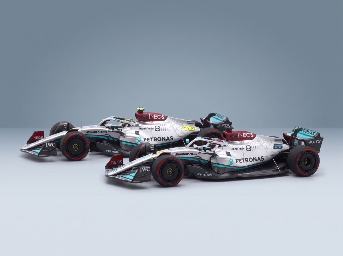 Mercedes W13E Set 2x Mercedes-AMG Petronas F1 No. 44 3rd Bahrain GP Lewis Hamilton No. 63 4th Bahrain GP George Russell 2022 Minichamps 1:43 scale model - rear three-quarter view