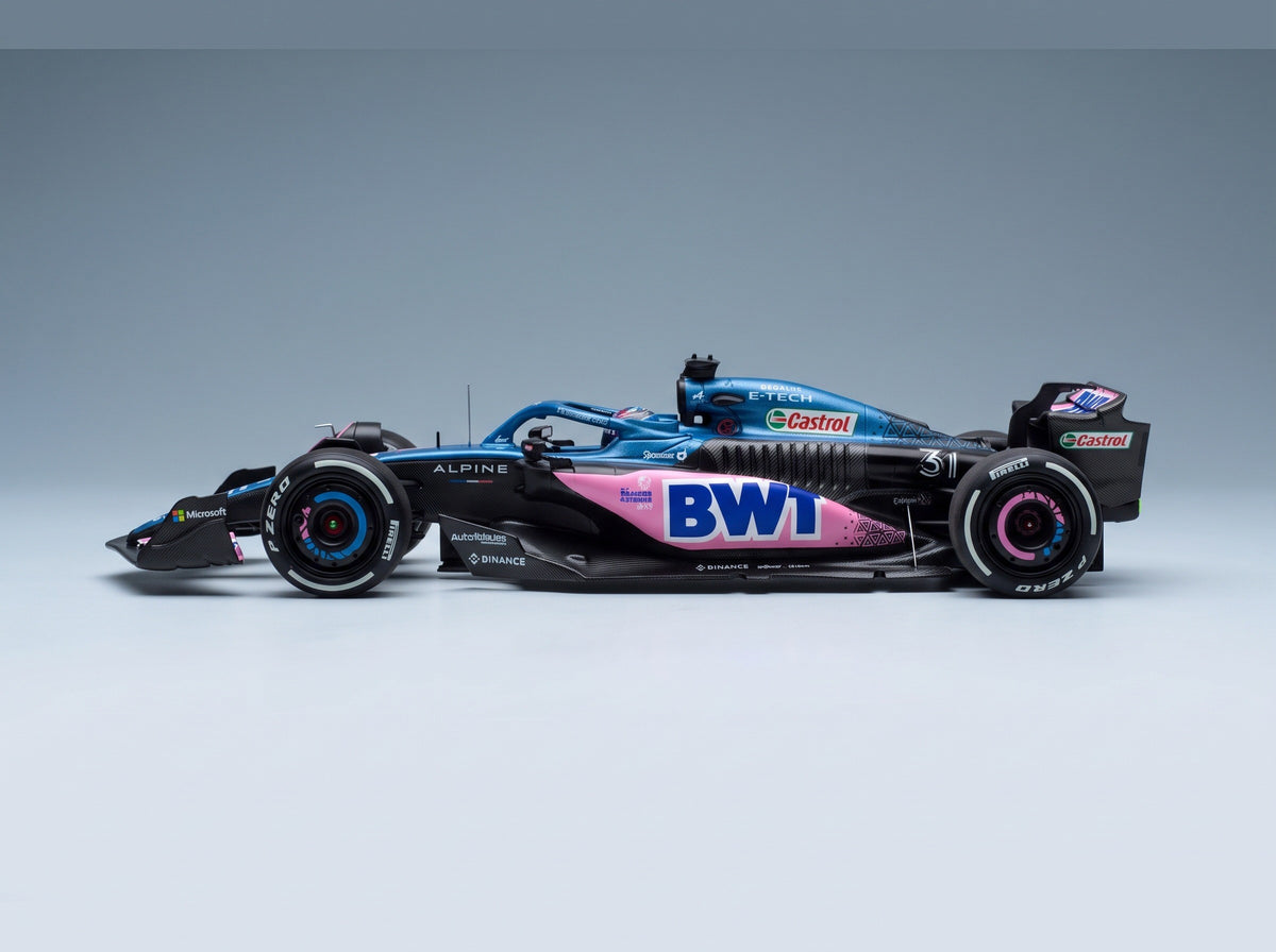 Alpine A523 BWT Alpine F1 Team No. 31 Esteban Ocon 8th Miami GP 2023 + No. 31 Bahrain GP 2023 Minichamps 1:43 scale model - front three-quarter view, top down