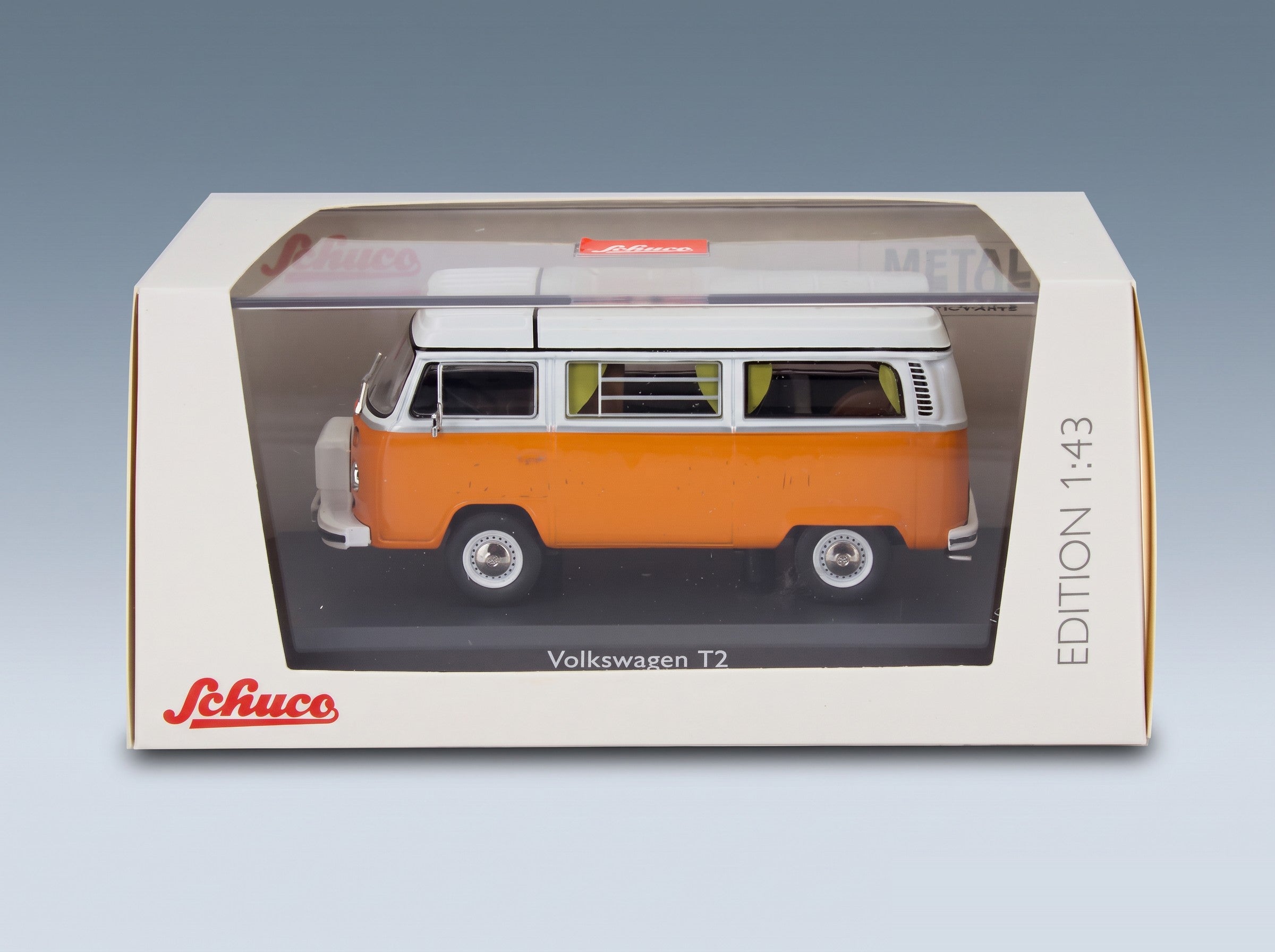 Volkswagen T2b Camper Van 1962 Orange White Schuco 1:43 scale model - original packaging