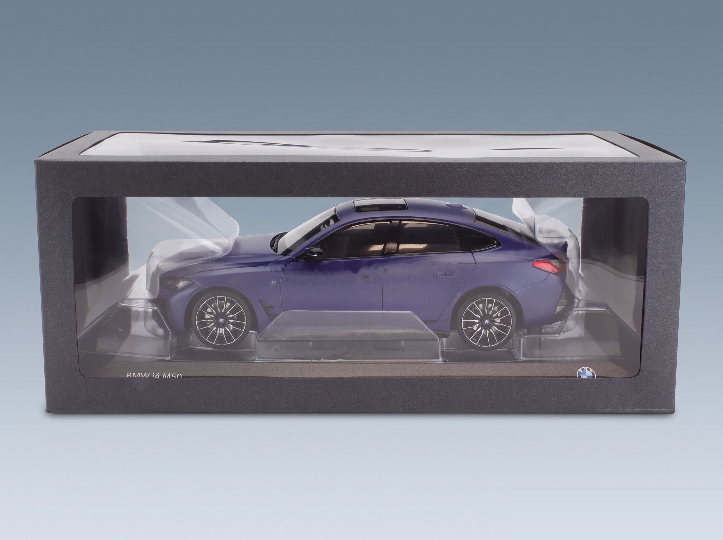 BMW 4-Series i4 M50 (G26) 2022 Matt Blue Minichamps 1:18 scale model - original packaging