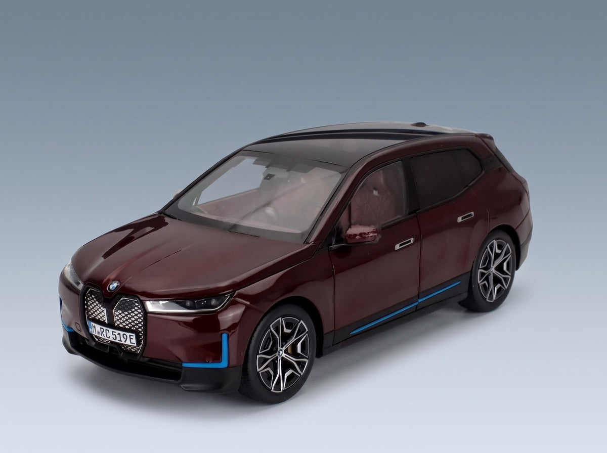 BMW iX SUV 2023 Red Minichamps 1:18 scale model - front three-quarter view