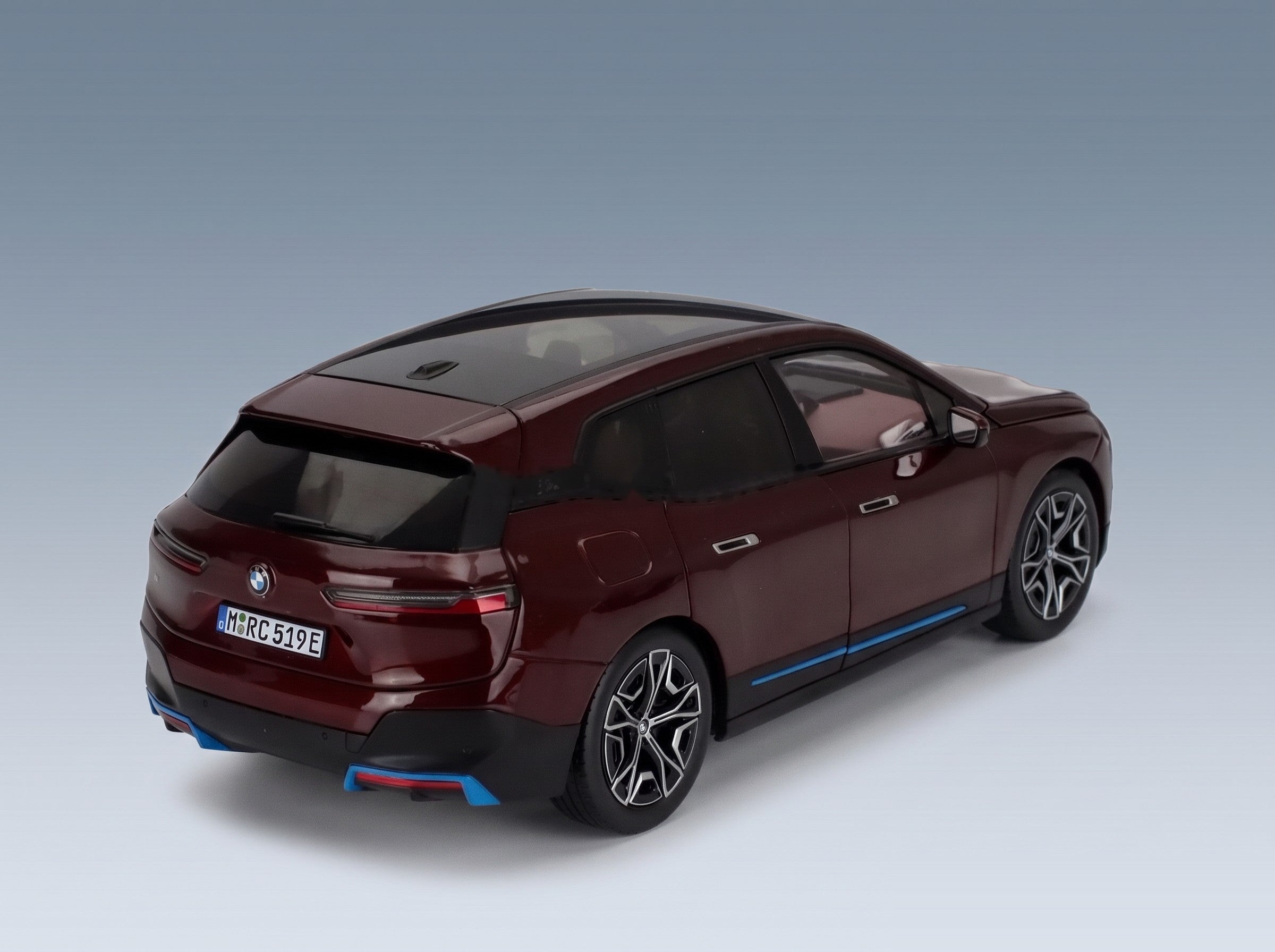 BMW iX SUV 2023 Red Minichamps 1:18 scale model - rear three-quarter view