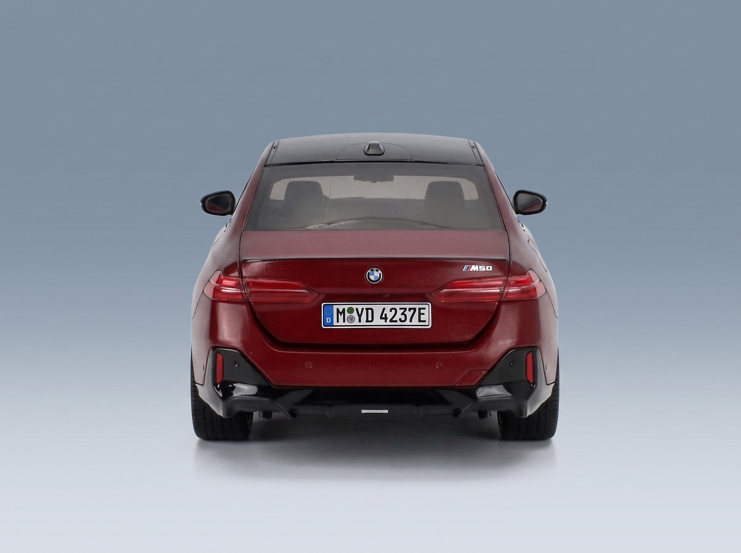 BMW i5 M50 (G60) 2023 Rosso Fuoco Minichamps 1:18 scale model - rear view