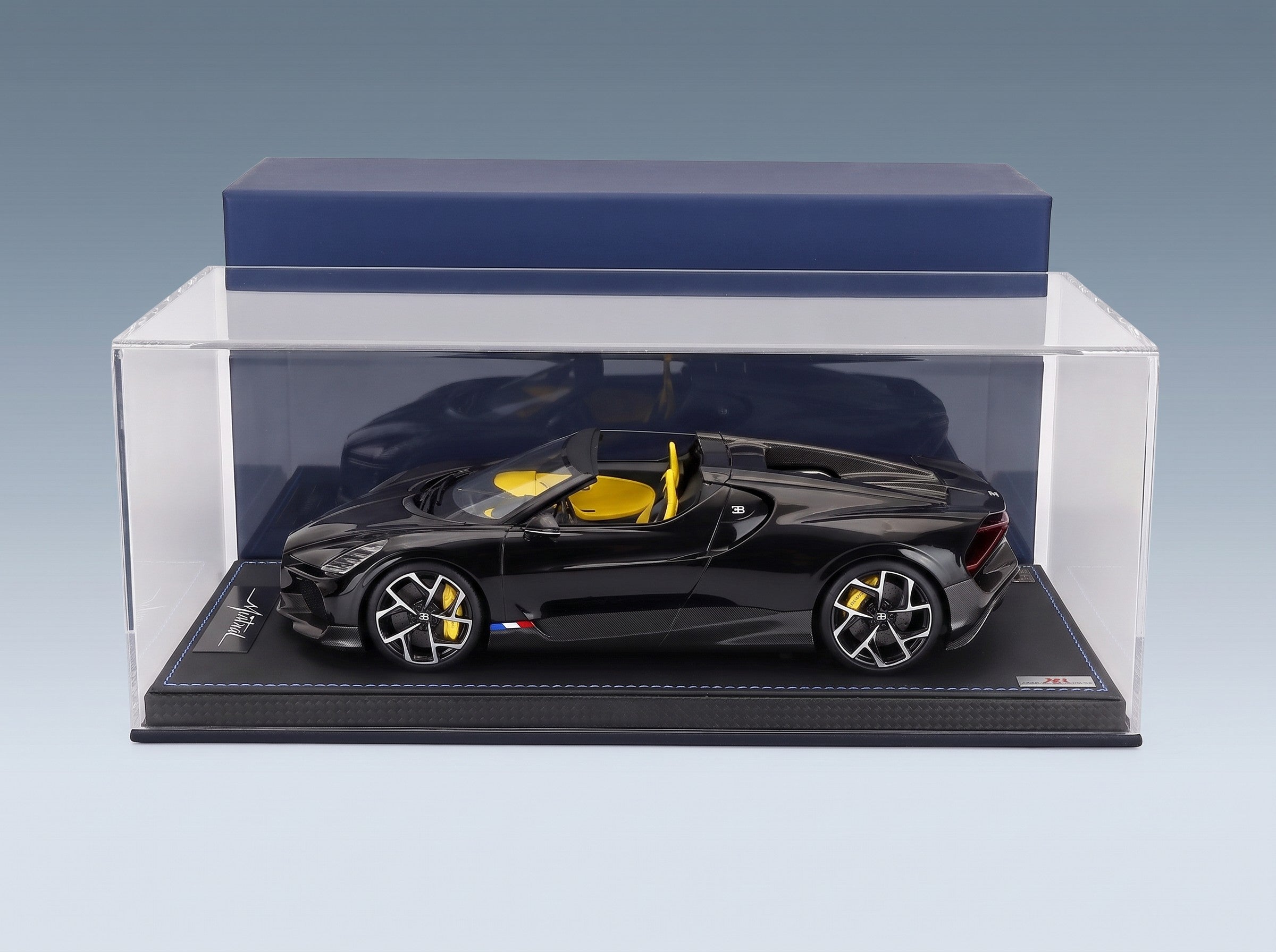Bugatti Mistral W16 2023 Black with Showcase MR Models 1:18 scale model - side view in display case