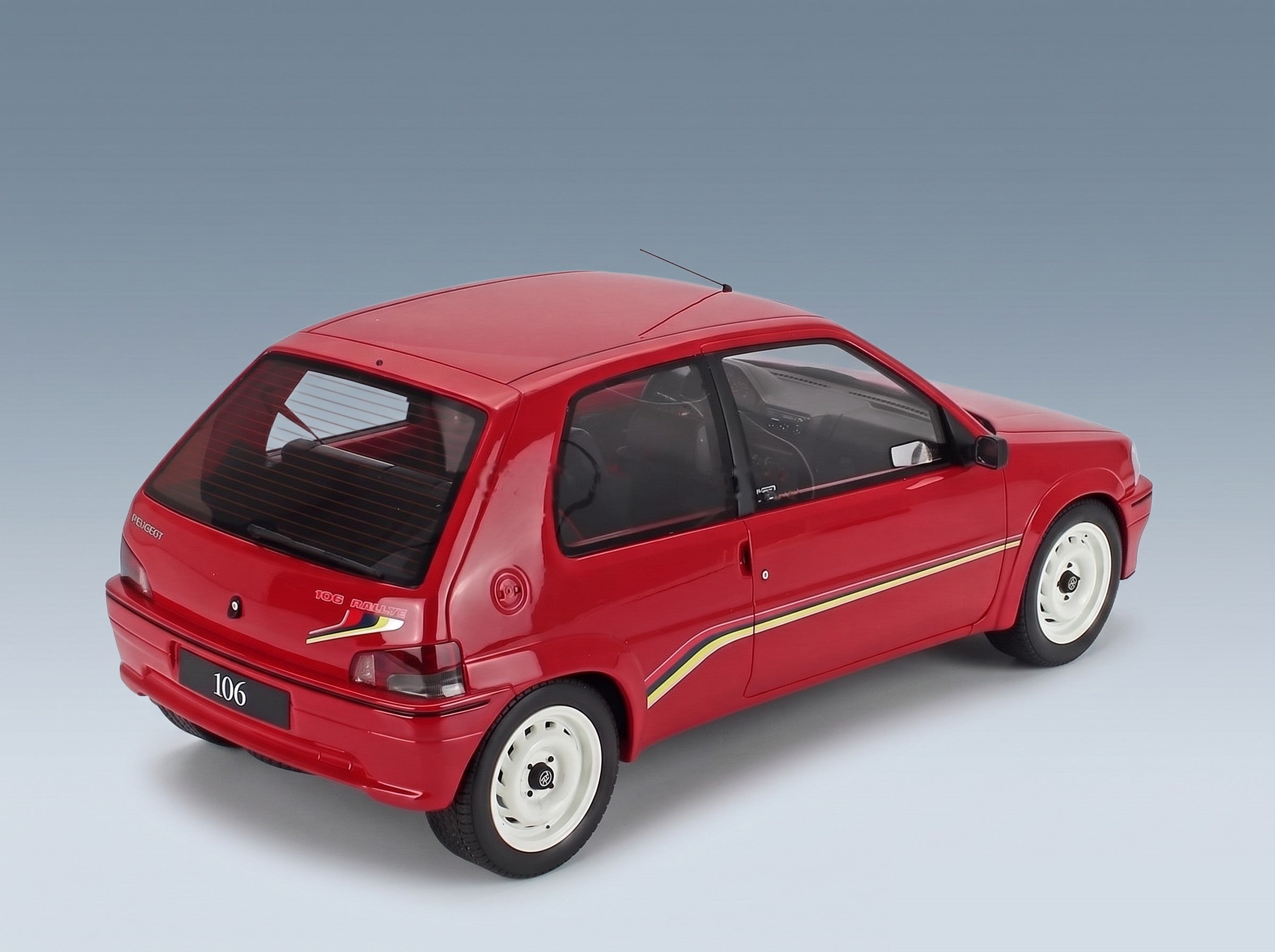 Peugeot 106 1.3 Rallye 1993 Red Otto-Mobile 1:12 scale model - rear three-quarter view