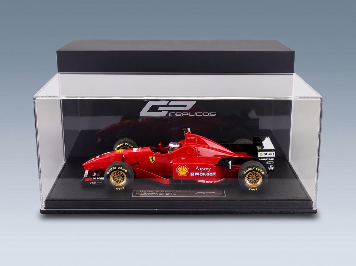 Ferrari F310 No. 1 Michael Schumacher Winner Spanish GP 1996 with Driver GP Replicas 1:18 scale model - side view in display case