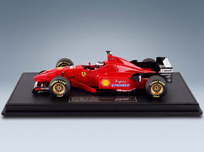 Ferrari F310 No. 1 Michael Schumacher Winner Spanish GP 1996 with Driver GP Replicas 1:18 scale model - side view