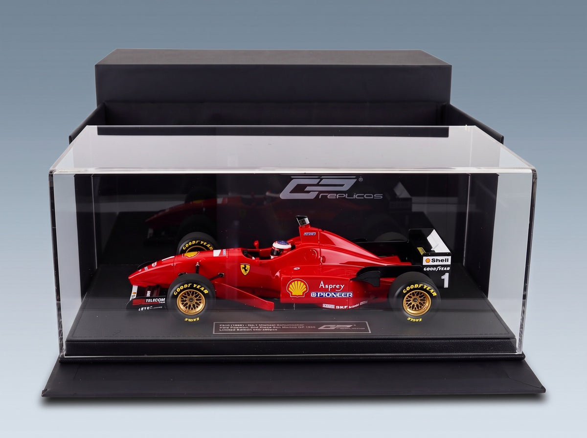 Ferrari F310 No. 1 Michael Schumacher Pole Position 2nd San Marino GP 1996 with Driver GP Replicas 1:18 scale model - side view in display case