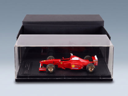 Ferrari F310B No. 5 Michael Schumacher Winner Japanese GP 1997 GP Replicas 1:43 scale model - side view in display case